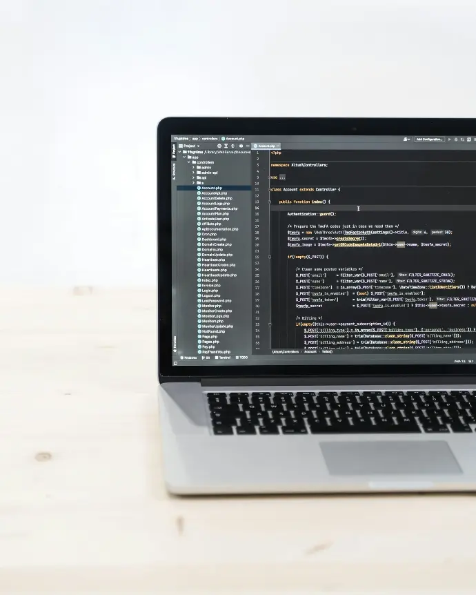 macbook pro on white table